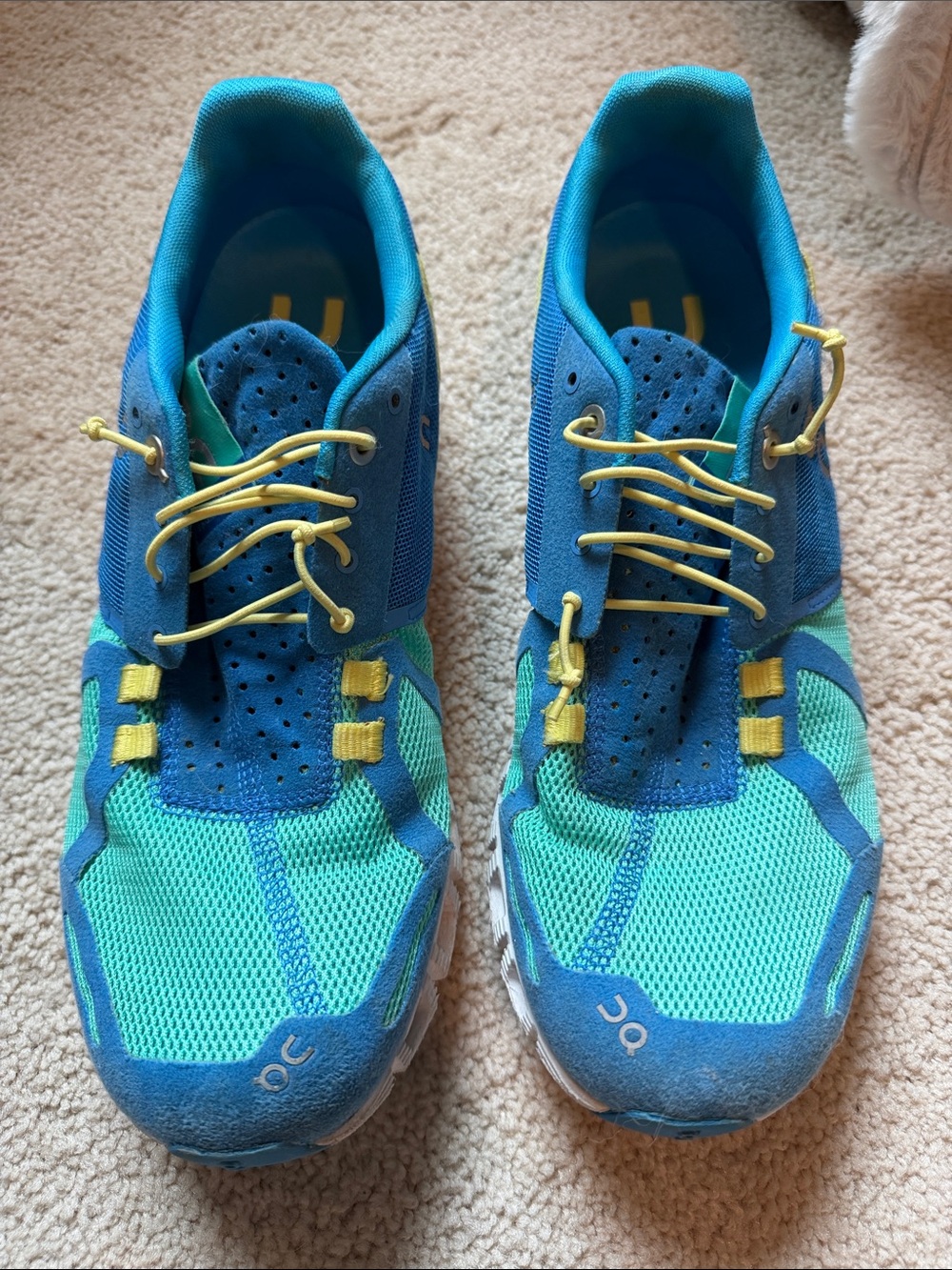 On Running Blue and Teal Mesh Sneakers with Yellow Accents